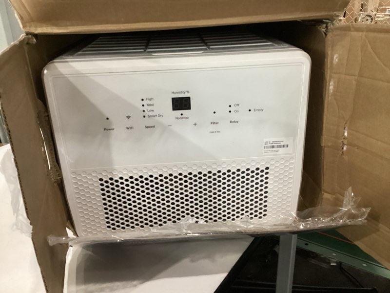 Condition photo showing As Is for used not tested ge smart portable dehumidifier w/wifi for basement, bedroom, bathroom, garage, large rooms up to 4500 sq ft, 50pint w/removable bucket & continuous drain connect for auto/manual drainage 50 pint - wifi