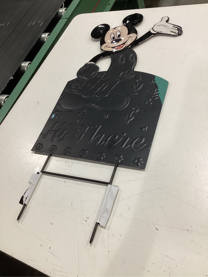 Condition photo showing As Is for disney 26-in multiple colors/finishes metal sign