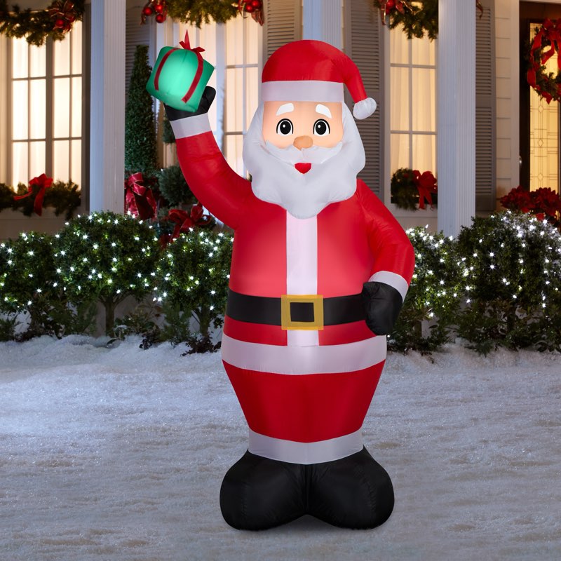 Holiday Living 7-ft Lighted Santa Christmas Inflatable in the Christmas