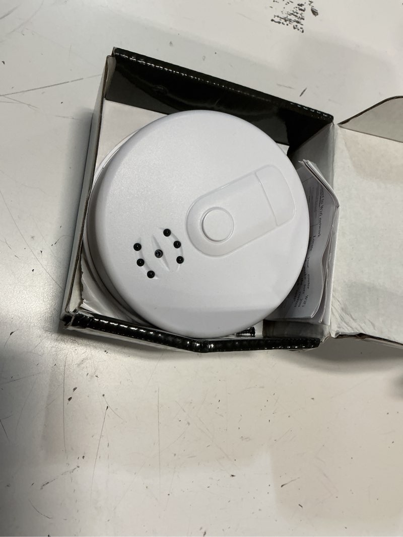 Condition photo showing As Is for hidden camera smoke detector, 1080p spy camera, wifi nanny cam with remote viewing, night vision, motion detection, 4hr battery for indoor surveillance