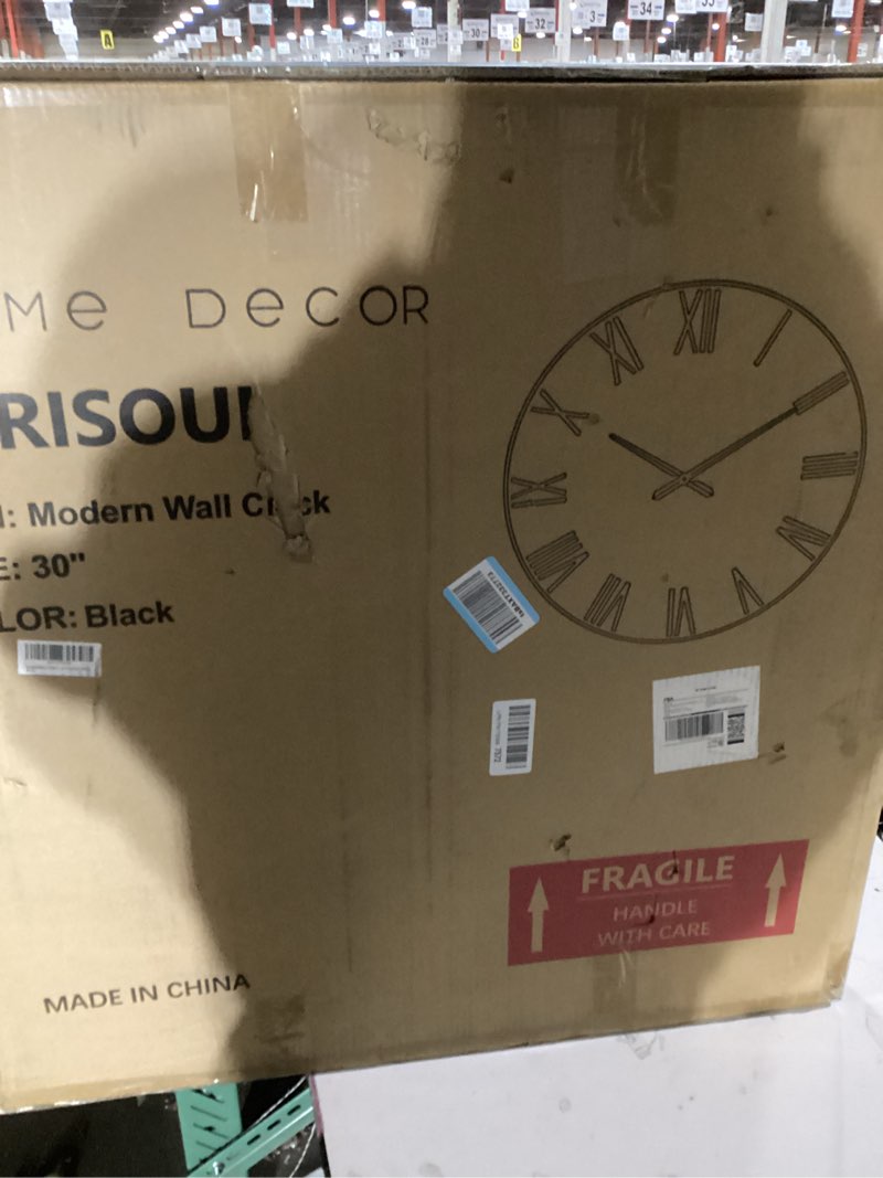 Condition photo showing New/Like New for oversized modern wall clock - 30 inch, contemporary simple, matte black, distressed gold roman numerals, metal face, battery operated, minimalist decorative wall clock for living room, kitchen black 30''