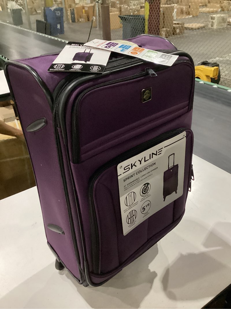 Condition photo showing Good Condition for skyline spinner carry on suitcase - 21", purple