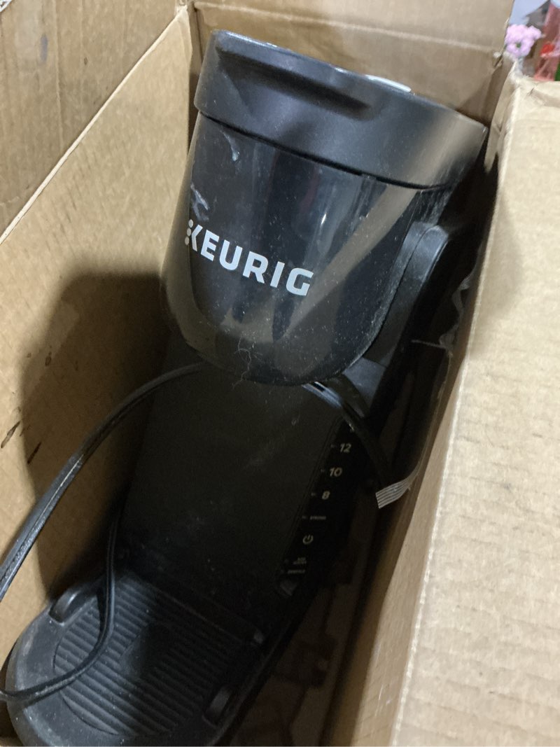 Condition photo showing As Is for keurig k-express single serve k-cup pod coffee maker, 3 brew sizes, strong button feature, 42oz removable reservoir, black