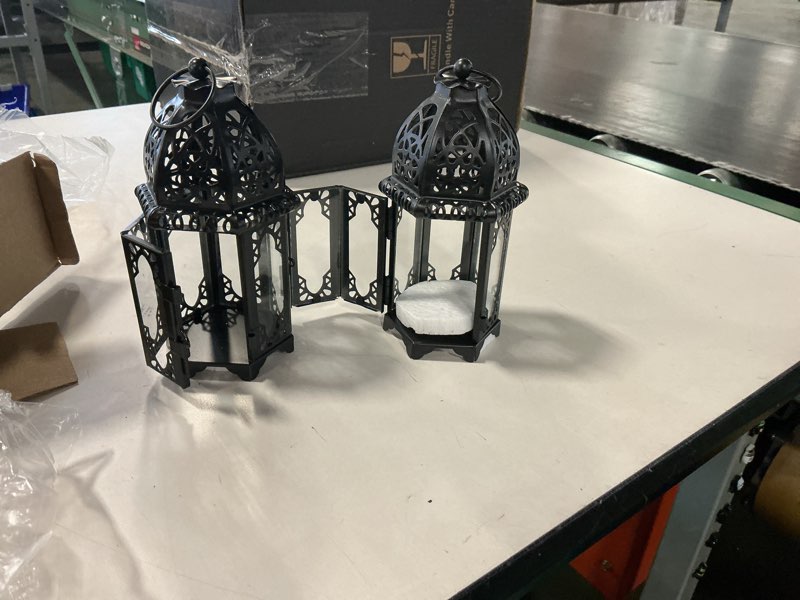 Condition photo showing New/Like New for NUPTIO Moroccan Style Candle Lantern, Small Sized Tealight Candle Holder with Transparent Glass Panels Great for Patio, Indoors/Outdoors, Events, Parties and Weddings (2 Pcs Small Size, Black) 2 Pcs Small Size Black