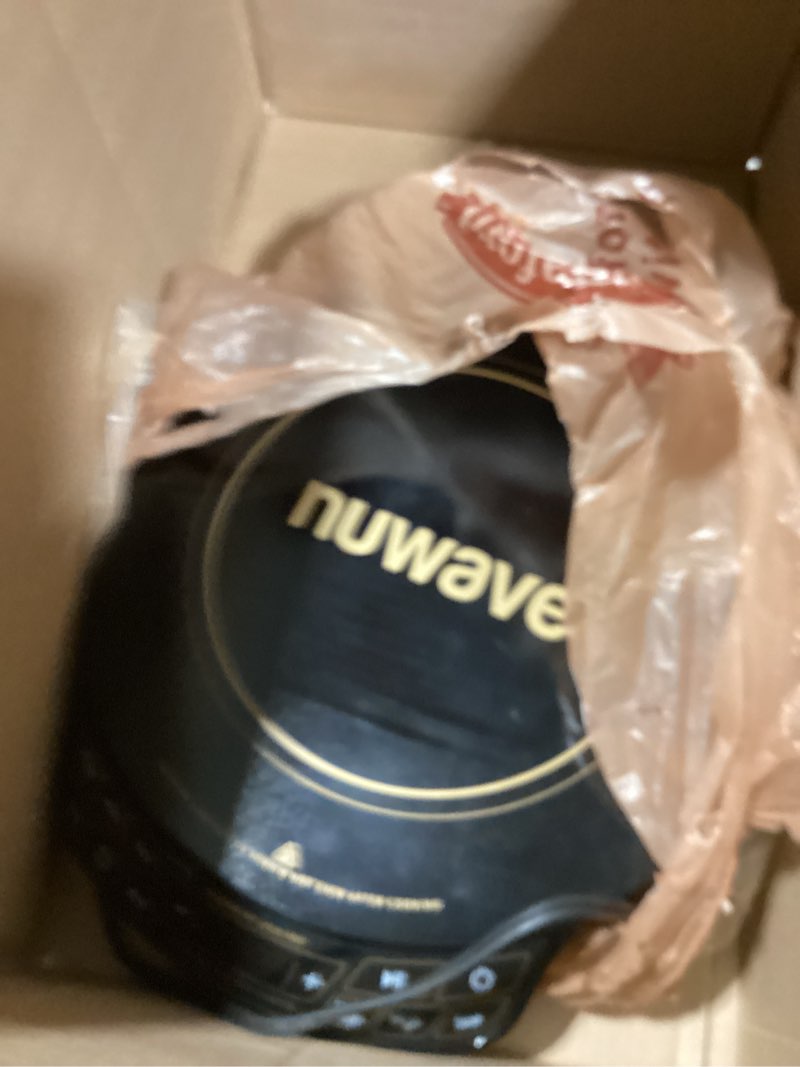 Condition photo showing As Is for nuwave precision induction cooktop gold, 12” shatter-proof ceramic glass surface, large 8” heating coil, portable, 51temp settings 100°f to 575°f, 3 wattage settings 600, 900, and 1500 watts