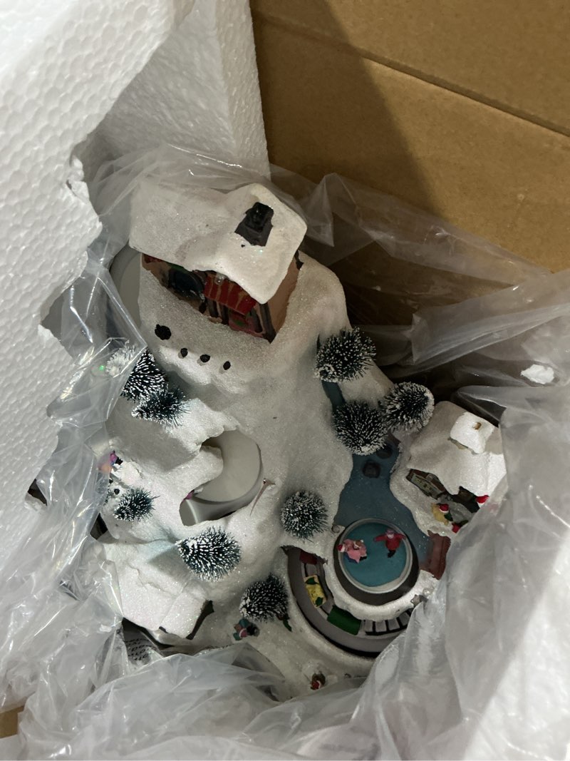 Condition photo showing Good Condition for Holiday Living Santa Fly Village Scene Animatronic Lighted Musical Village Scene