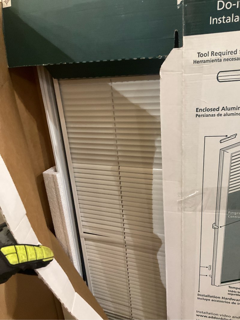 Condition photo showing As Is for odl add on blind 0.59-in slat width 22-in x 64-in cordless white aluminum light filtering