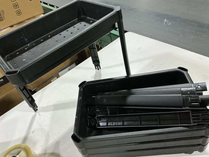 Condition photo showing As Is for small 4 tier black shelving