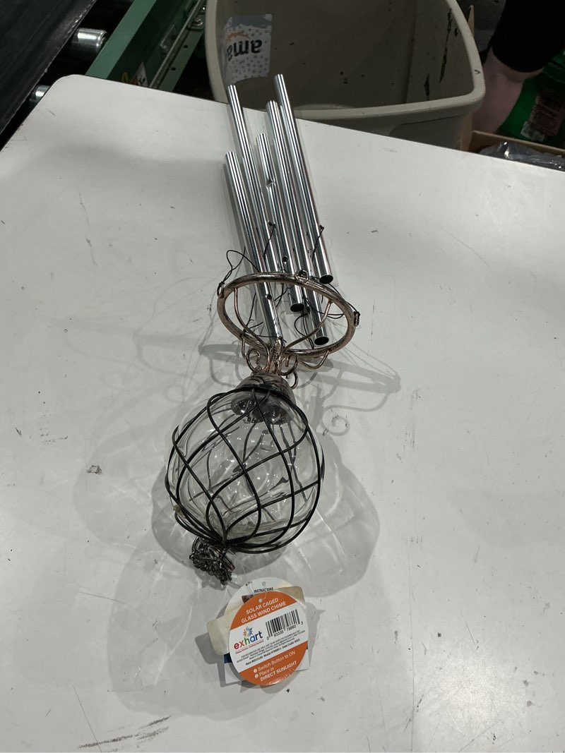 Condition photo showing As Is for exhart bronze windchime w/amber solar crystal ball – solar glass ball garden chimes w/solar-powered lights in bronze metal cage finial design - hand-blown glass orb, tuned windchimes