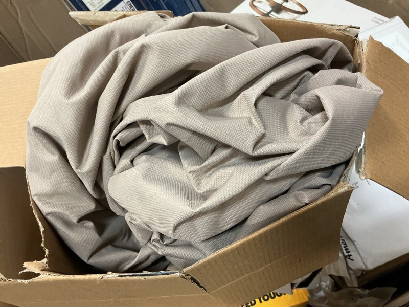 Condition photo showing As Is for style selections tan polyester patio furniture cover for dining table (round)