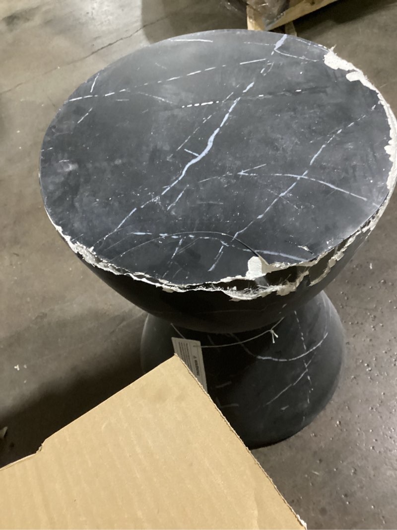 Condition photo showing As Is for some damage , as is , christopher knight home urkta hourglass-shaped light weight concrete side table,black marble