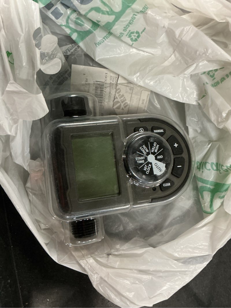 Condition photo showing As Is for 1-outlet hose faucet timer