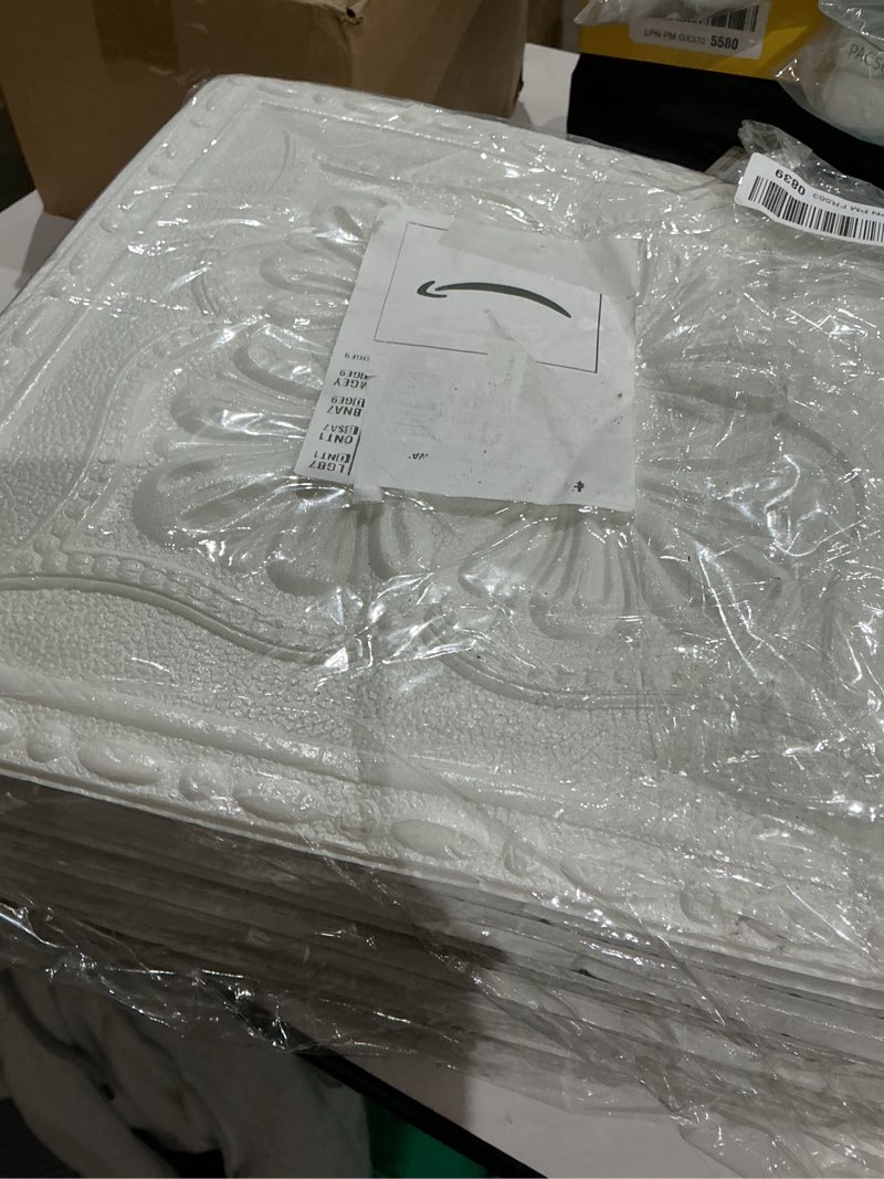 Condition photo showing Good Condition for ceiling tiles peel and stick, 32 pcs ceiling tiles foam, covered 42 sq.ft, easy to install and cut for ceil and interior wall decor, plain white?13.8 x 13.8 inch? 32 pcs floral