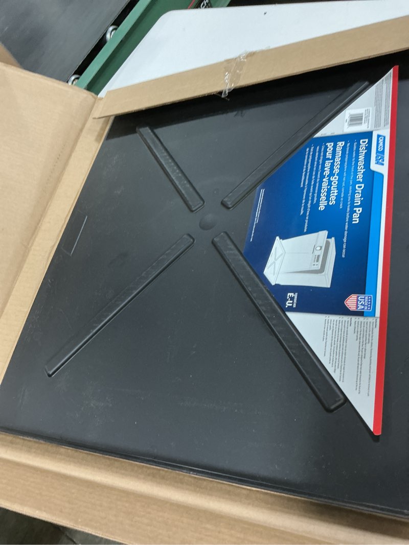 Condition photo showing Good Condition for camco dishwasher drain pan | protects floors, cabinets, walls & features front opening for easy leak detection | crafted of heavy-duty polymer | black, 23-5/8” x 20-1/2” (20602)