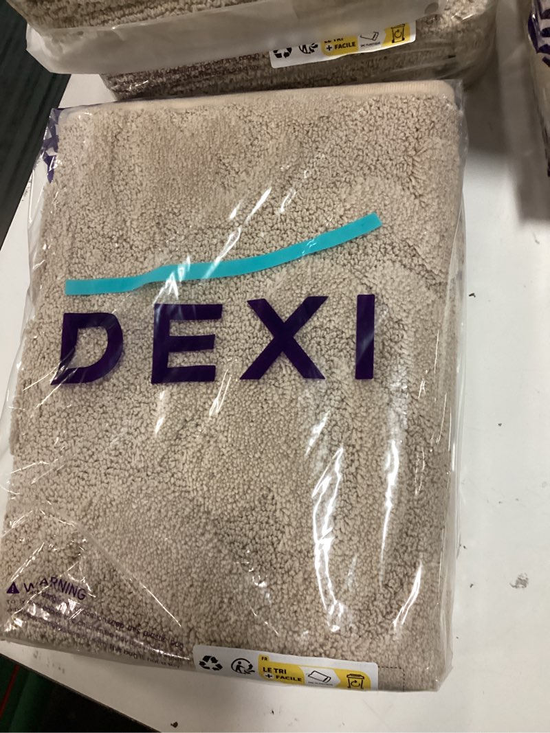 Condition photo showing New/Like New for dexi bathroom rug 24x36, non slip washable bath mat for shower floor, absorbent soft bathmat with rubber backing, plush fluffy microfiber floral retro carpet, beige 2' x 3' (rectangular) beige-flower