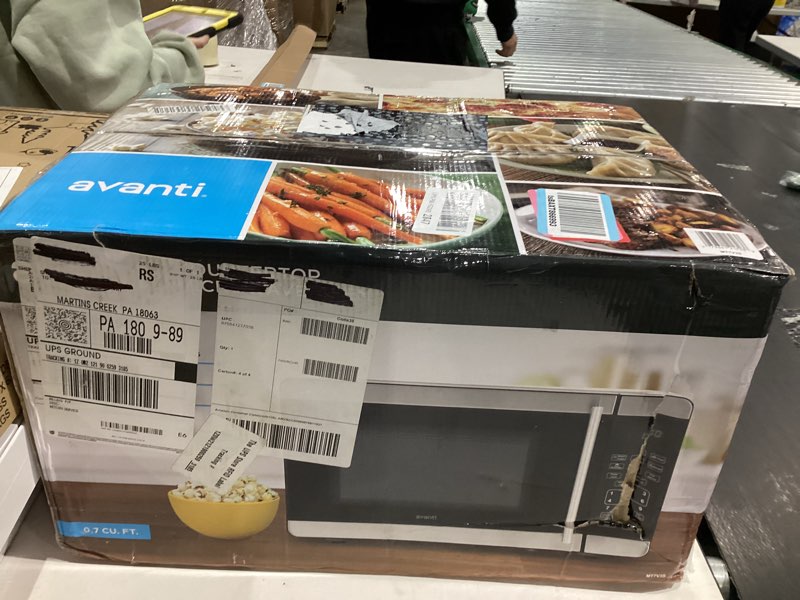 Condition photo showing New/Like New for Avanti Microwave Oven 700-Watts Compact with 6 Pre Cooking Settings, Speed Defrost, Electronic Control Panel and Glass Turntable, 0.7-Cu.Ft., Metallic