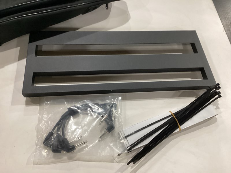 Condition photo showing New/Like New for Medium Guitar Pedal Board, 20x8x1.2", Aluminum Alloy Black Effects Pedal Board with 4 Pcs 6 Inch Guitar Pedal Cable, Carrying Bag, Adhesive Hookside Tape Medium Board with Bag & 4 Cords