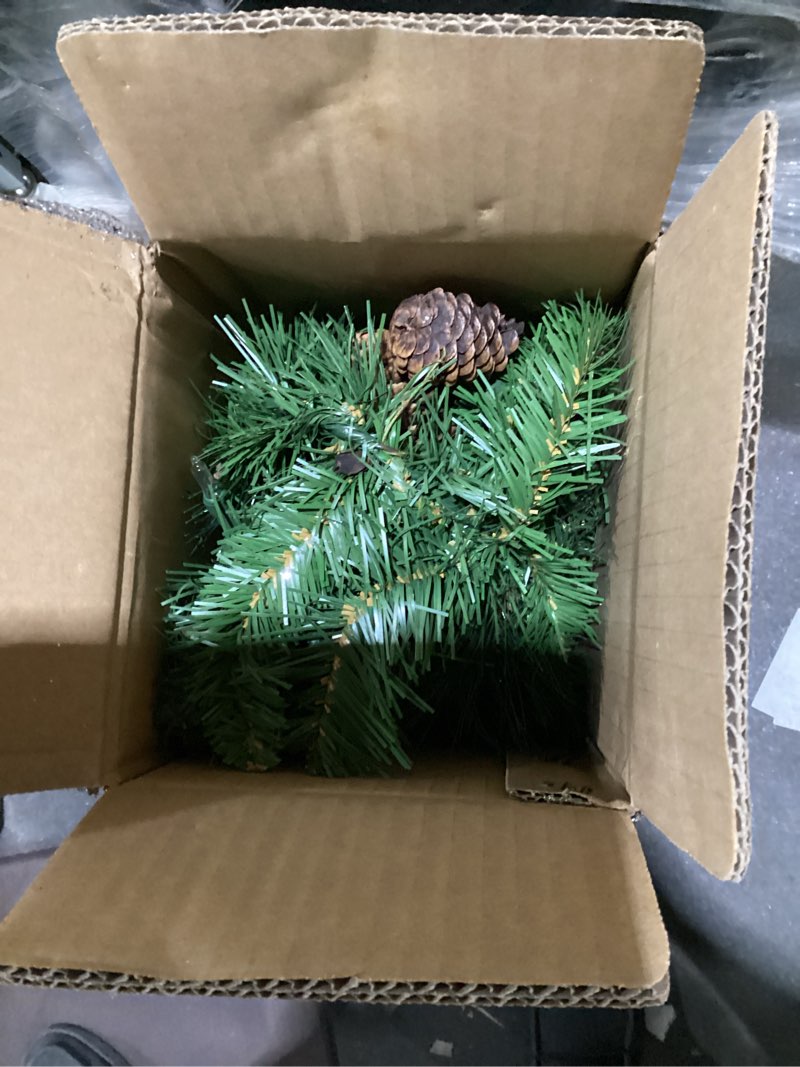 Condition photo showing New/Like New for national tree company 9 ft pre-lit crestwood spruce artificial christmas garland, christmas decoration with glitter, pinecones, red berries, 50 clear lights, 180 tips, green plug in tree