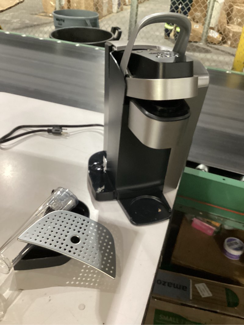 Condition photo showing As Is for keurig k-elite single serve k-cup pod coffee maker, with strength and temperature control, iced coffee capability, 8 to 12oz brew size, programmable, brushed silver