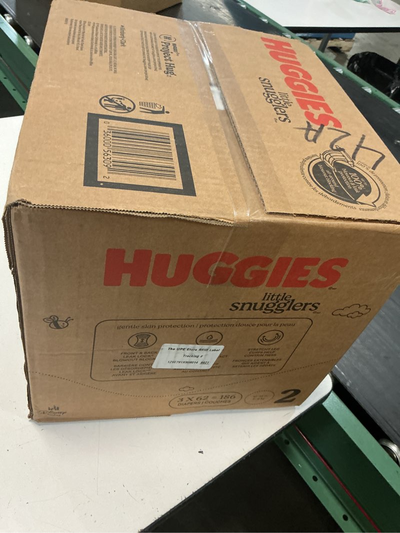 Condition photo showing New/Like New for huggies size 2 diapers, little snugglers baby diapers, size 2 (12-18 lbs), 186 count (3 packs of 62), packaging may vary size 2 186