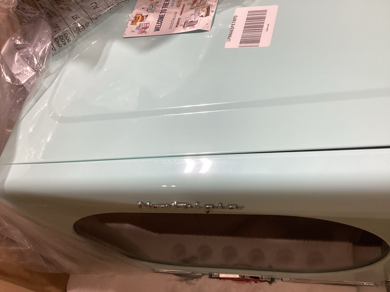 Condition photo showing As Is for Nostalgia Retro Compact Countertop Microwave Oven, 0.7 Cu. Ft. 700-Watts with LED Digital Display, Child Lock, Easy Clean Interior, Aqua Retro Classic 0.7 Cu. Ft. Aqua