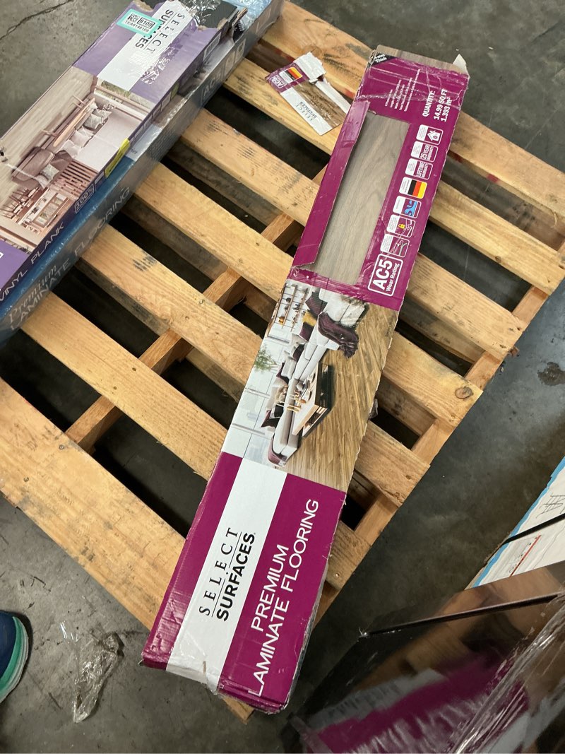Condition photo showing Good Condition for select surfaces smokey walnut waterproof laminate flooring, 14.99 sq. ft. per box