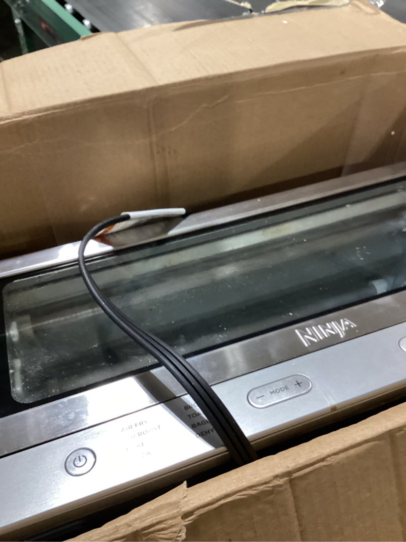 Condition photo showing As Is for Ninja Air Fryer Toaster Oven Combo | 8-in-1 Functionality | Flip Up & Away for Storage Space | Air Fry Basket, Sheet Pan, Wire Rack & Removable Crumb Tray |1800 Watt | Stainless Steel | SP151 Stainless Premium 8-in-1 Flip Oven