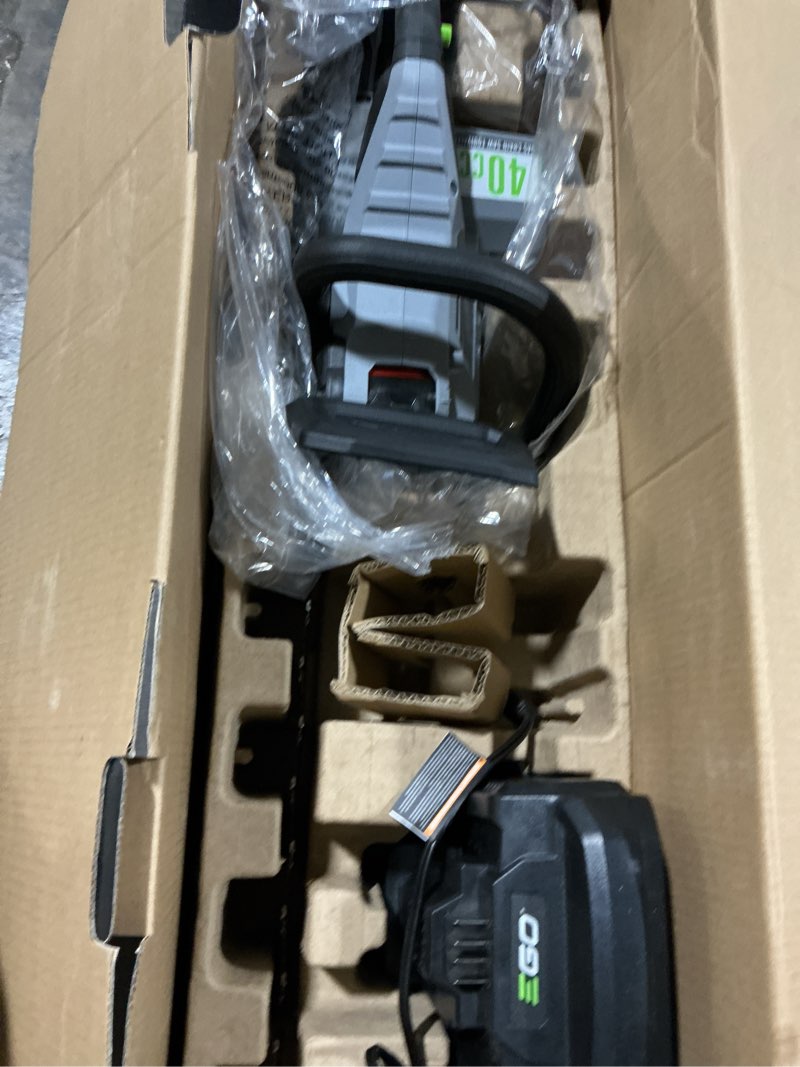 Condition photo showing As Is for ego 56-volt 16-in battery 2.5 ah chainsaw (battery and charger included)