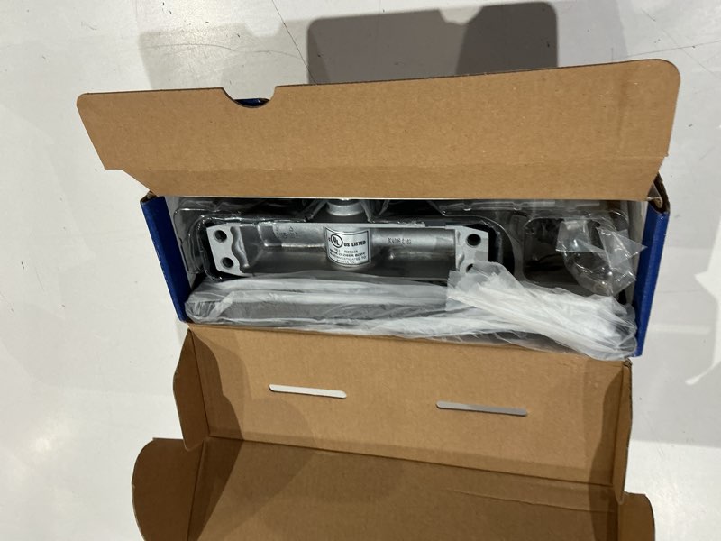 Condition photo showing As Is for brinks residential matte black metal hydraulic door closer