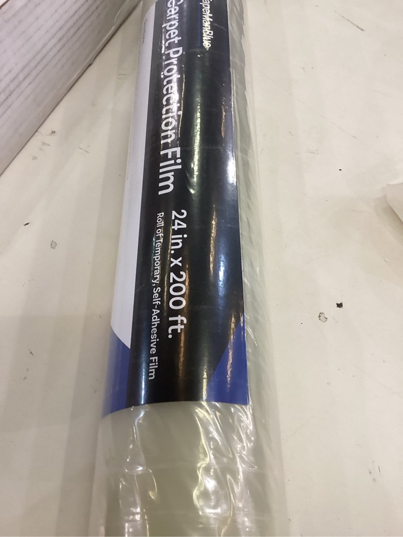 Condition photo showing Good Condition for TapeManBlue Carpet Protection Film 24" x 200' roll, Self Adhesive Plastic Carpet Protector Film with Clean Removal & Easy Unwind, Durable Protection Tape to Shield Your Surface from Dirt and Spills