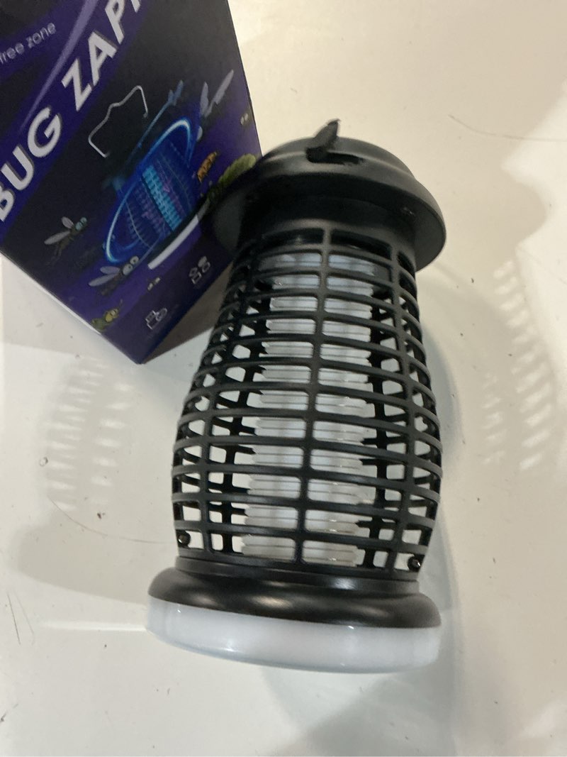 Condition photo showing New/Like New for bug zapper outdoor & indoor,cordless portable mosquito zapper with automatic mode,4200v high powered mosquito repellent,electric fly zapper for camping,outside,patio,backyard,garden black