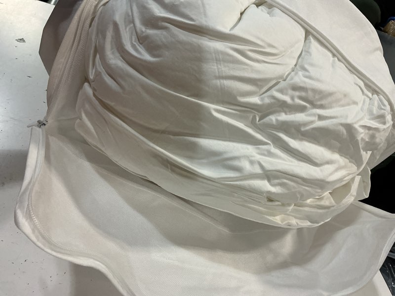 Condition photo showing As Is for premium down alternative comforter, king/cal king, white