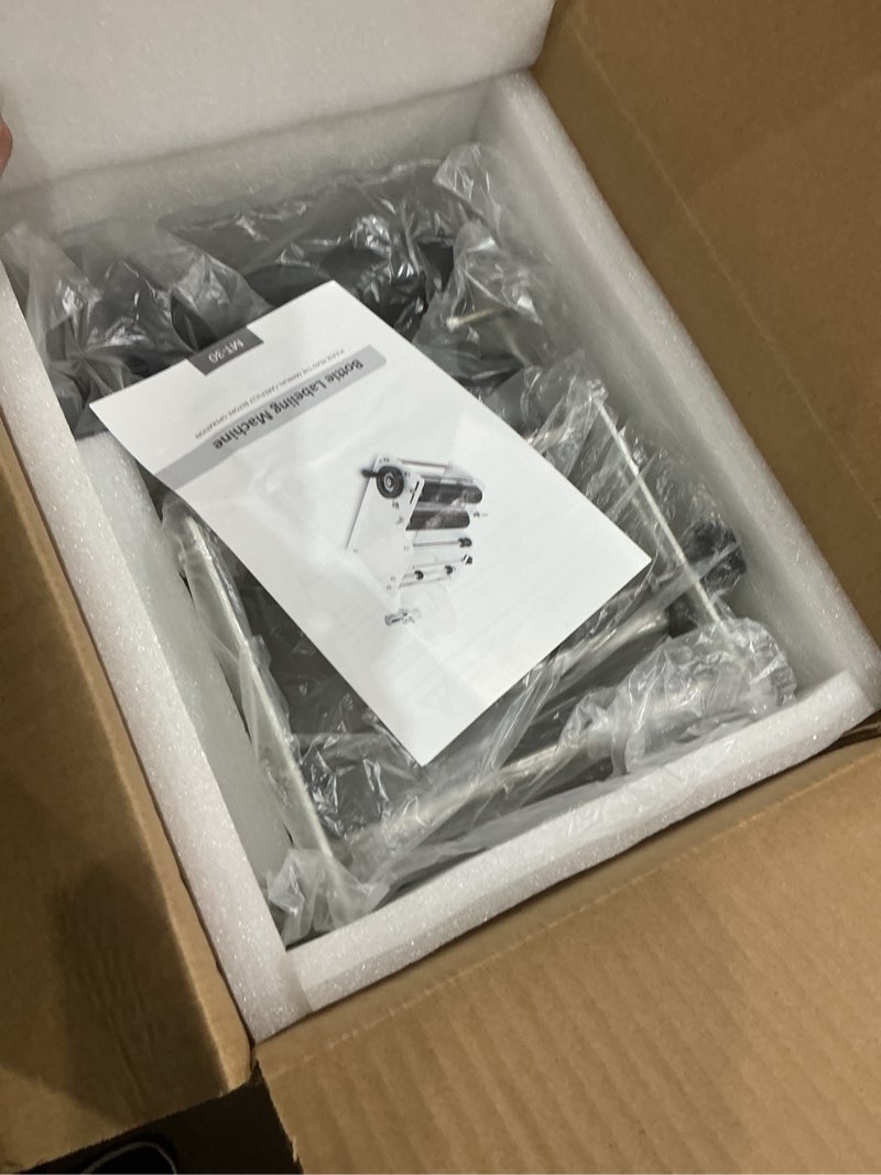 Condition photo showing New/Like New for vevor manual round labeling machine, 15-20pcs/min, applicator for round bottles, adjustable for 0.78-4.72 inch diameter (with pressing bar)