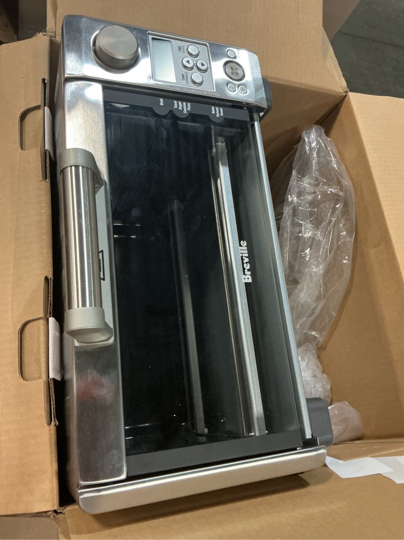 Condition photo showing As Is for breville bov450xl mini smart countertop oven and toaster oven, small, brushed stainless steel