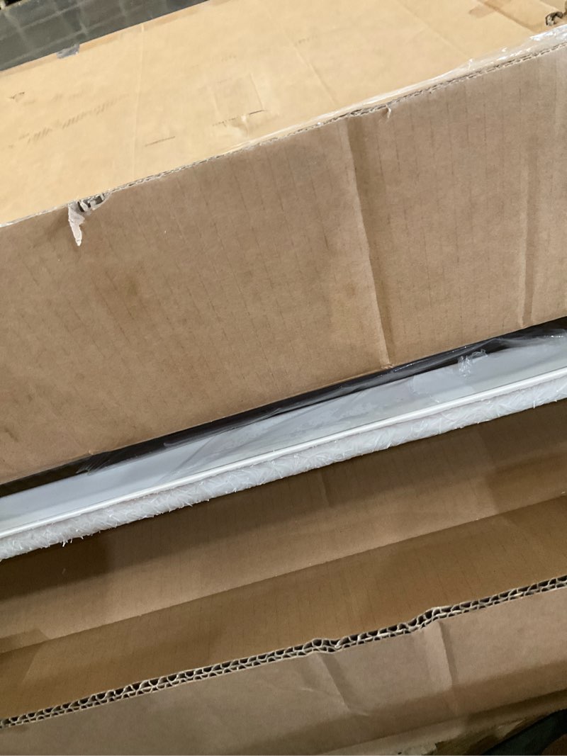 Condition photo showing As Is for dreamline slimline 32 in. d x 54 in. w x 2 3/4 in. h center drain single threshold shower base in biscuit, dlt-1132540-22 biscuit 32 inch d x 54 inch w center drain