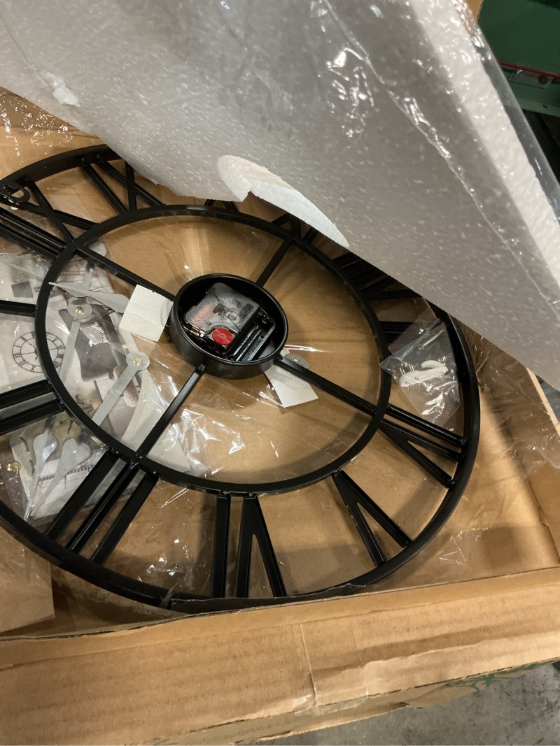 Condition photo showing As Is for LEIKE 16" Large Wall Clocks Battery Operated, Round Modern Silent Non-Ticking Black Metal Wall Clock for Living Room Decor, Bedroom Kitchen (40cm Diameter, Black Roman Number) 16 Inch Black-roman Number