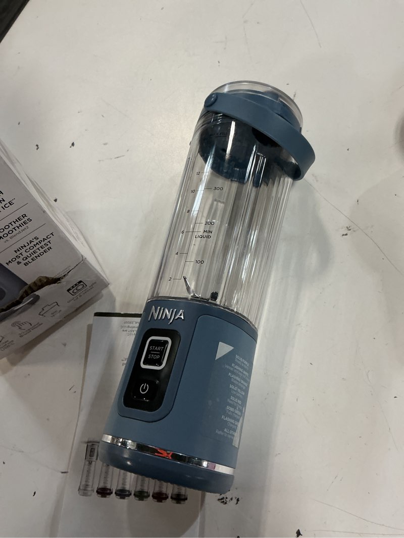 Condition photo showing As Is for ninja bc151nv blast portable blender, cordless, 18oz. vessel, personal blender-for shakes & smoothies, bpa free, leakproof-lid & sip spout, usb-c rechargeable, dishwasher safe parts, denim blue