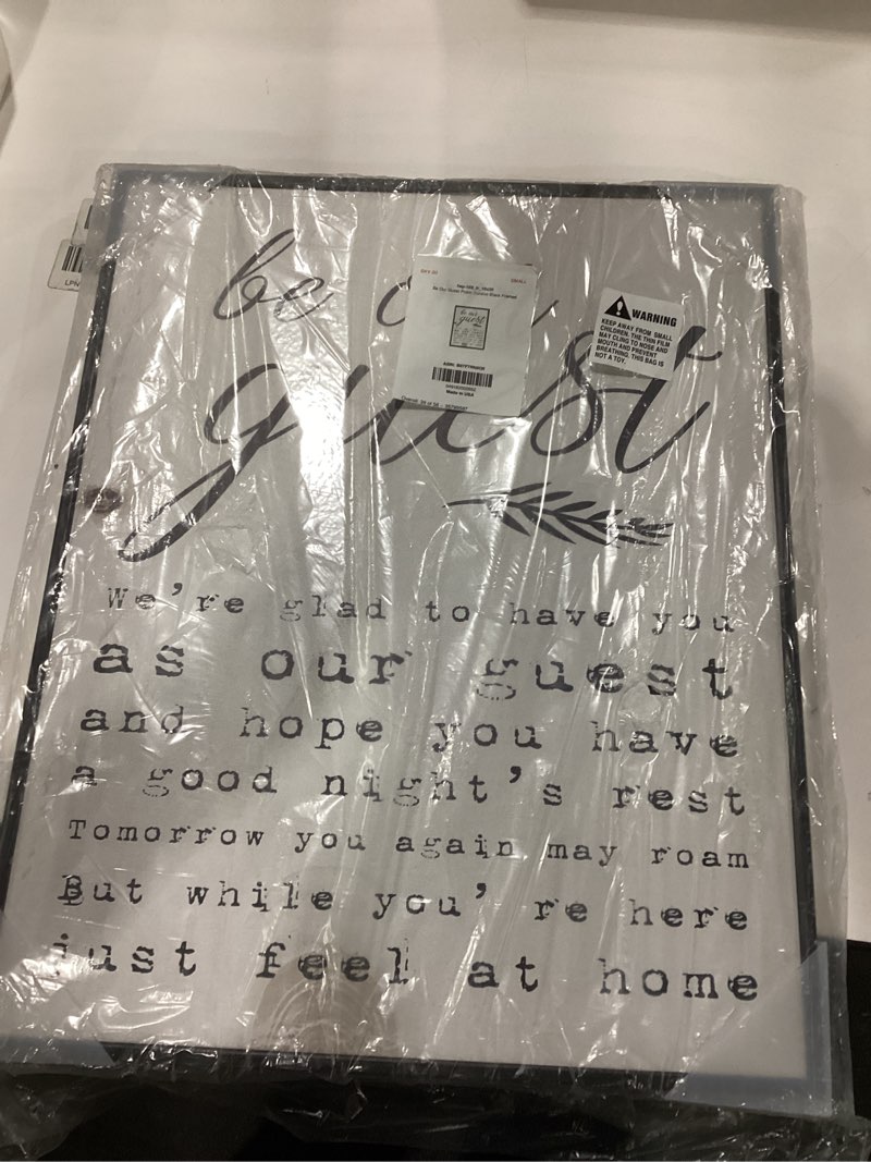 Condition photo showing New/Like New for Stupell Industries Be Our Guest Poem Cursive Black Framed Wall Art, 16 x 20, Design by Artist Daphne Polselli Design By Artist Daphne Polselli Framed 16"L x 1.5"W