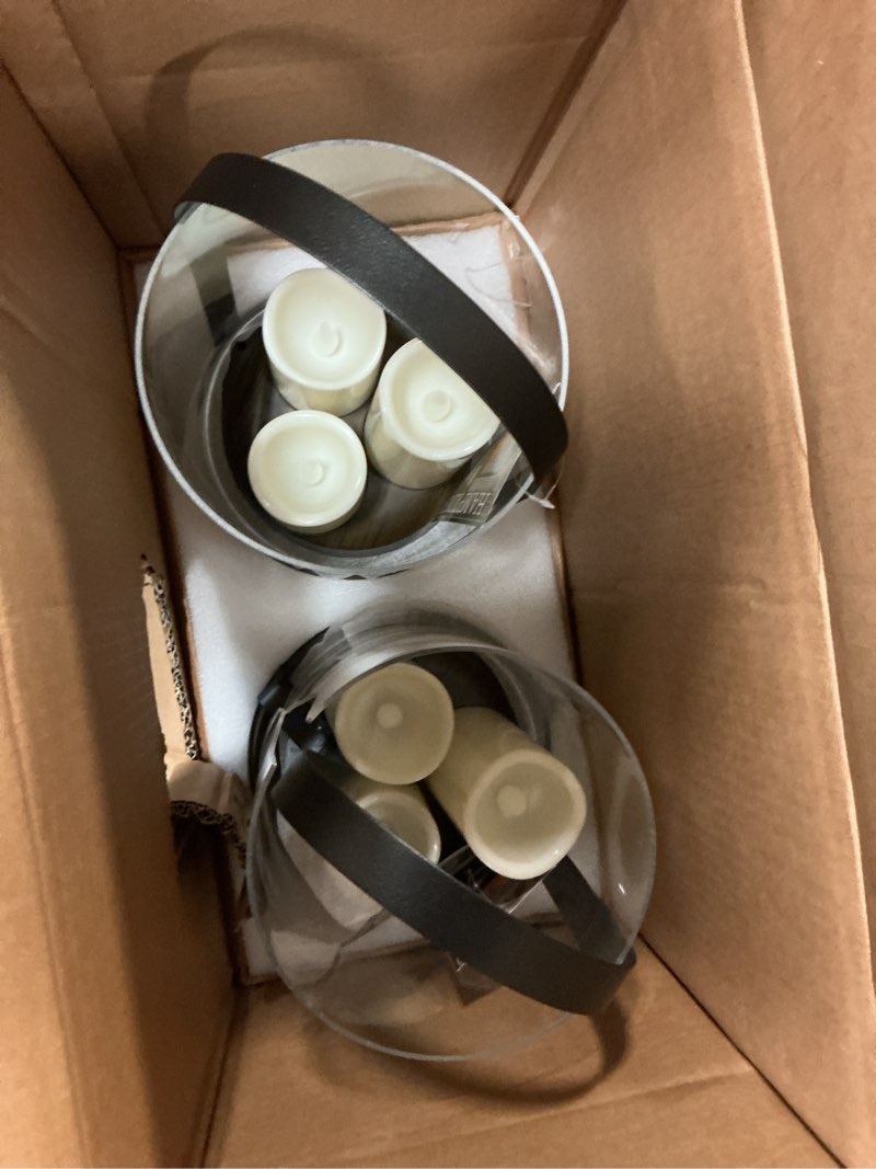 Condition photo showing As Is for 14.96 in. outdoor patio round handle lantern with 3 led candles