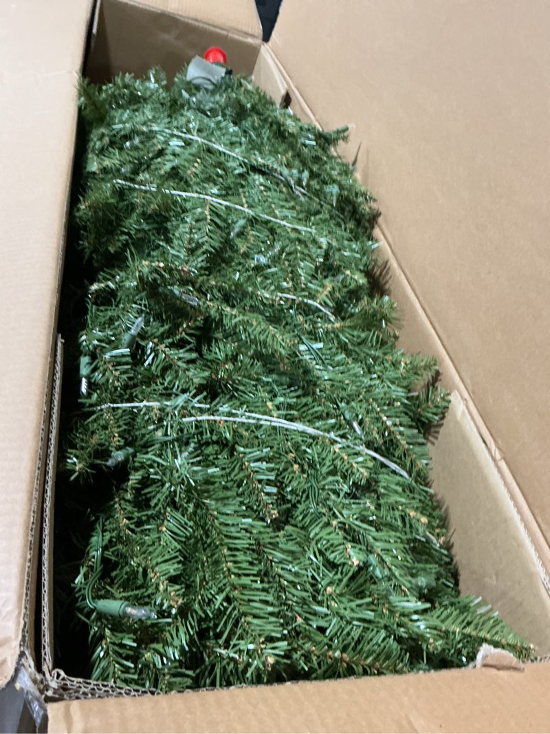 Condition photo showing As Is for National Tree Company 7.5 ft Pre-Lit Dunhill Fir Artificial Christmas Tree, 700 LED Lights, 2,514 Tips, Foot Pedal, 10 Light Functions, Includes Stand, Green