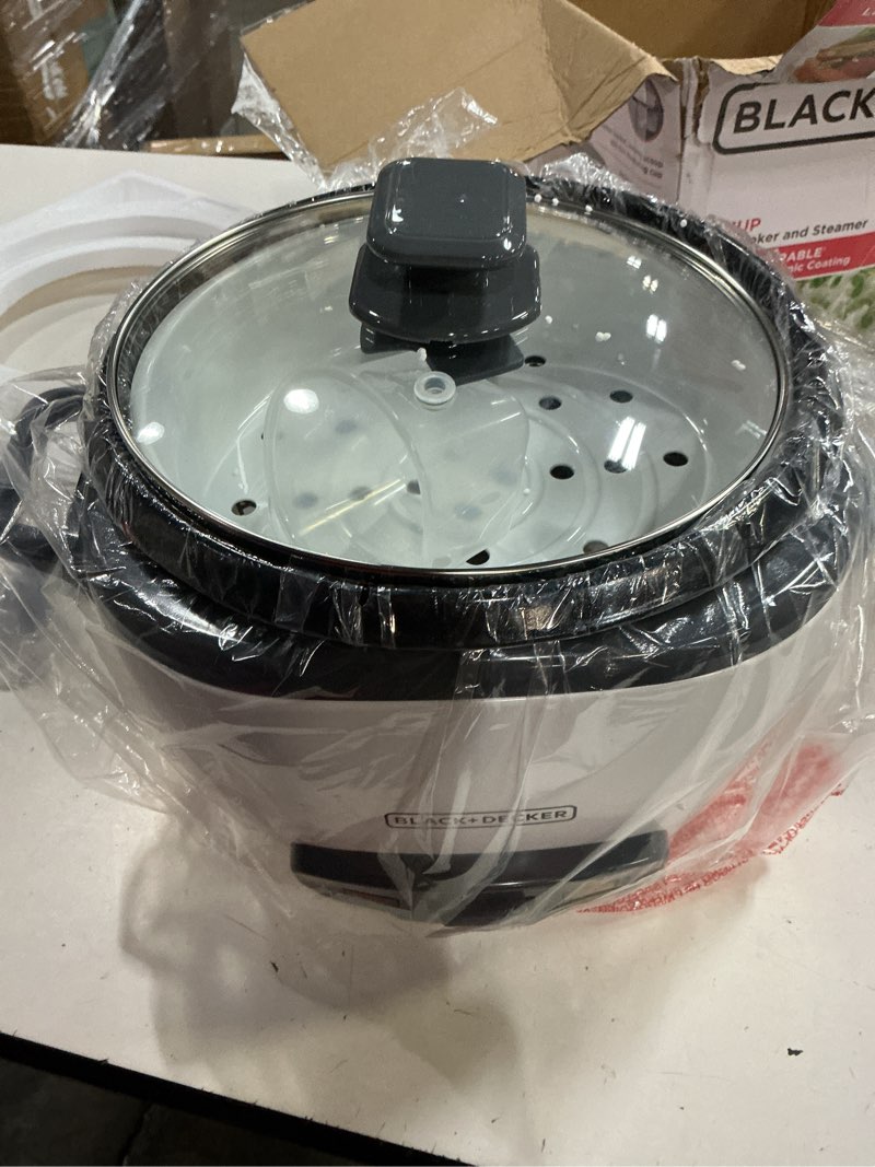 Condition photo showing New/Like New for black+decker 16-cup rice cooker, 8-cup uncooked rice, steaming basket, removable non-stick bowl, one touch, keep warm
