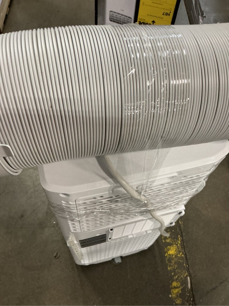 Condition photo showing As Is for 6,000 btu (8,765 btu ashrae) 115-volt portable air conditioner cools 250 sq. ft. with dehumidifier and lcd remote