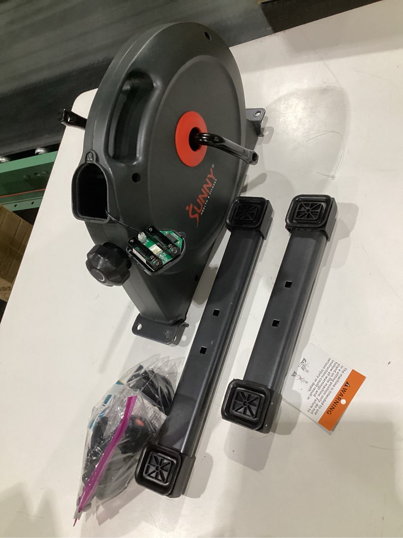 Condition photo showing As Is for (DAMAGED) Sunny Health & Fitness Smart Under-Desk Bike Exerciser, Low-Impact Cardio Cycling Equipment for Home/Office, Mini Paddler for Arm/Leg Mobility Training, Free SunnyFit App Connect, Optional Motorized Black