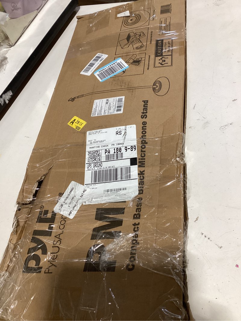 Condition photo showing New/Like New for pyle adjustable microphone stand - universal mic stand with compact heavy base, floor standing design, height adjustable, pivot angle clip for singing & recording (2.8’ - 5’ ft., 9.8” base diameter) 1 pack