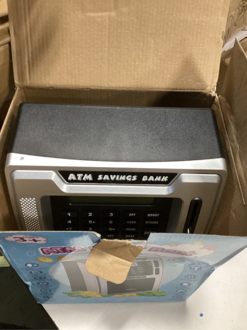 Condition photo showing Good Condition for Fishboy Talking ATM Piggy Bank for Kids with Dual Debit Cards, Power-Off Memory, Auto-Opening Drawer for Real Money for Boys, Onekey Shutdown, Bill Feeder, Coin Recognition, Balance Calculator Machine Black/Silver