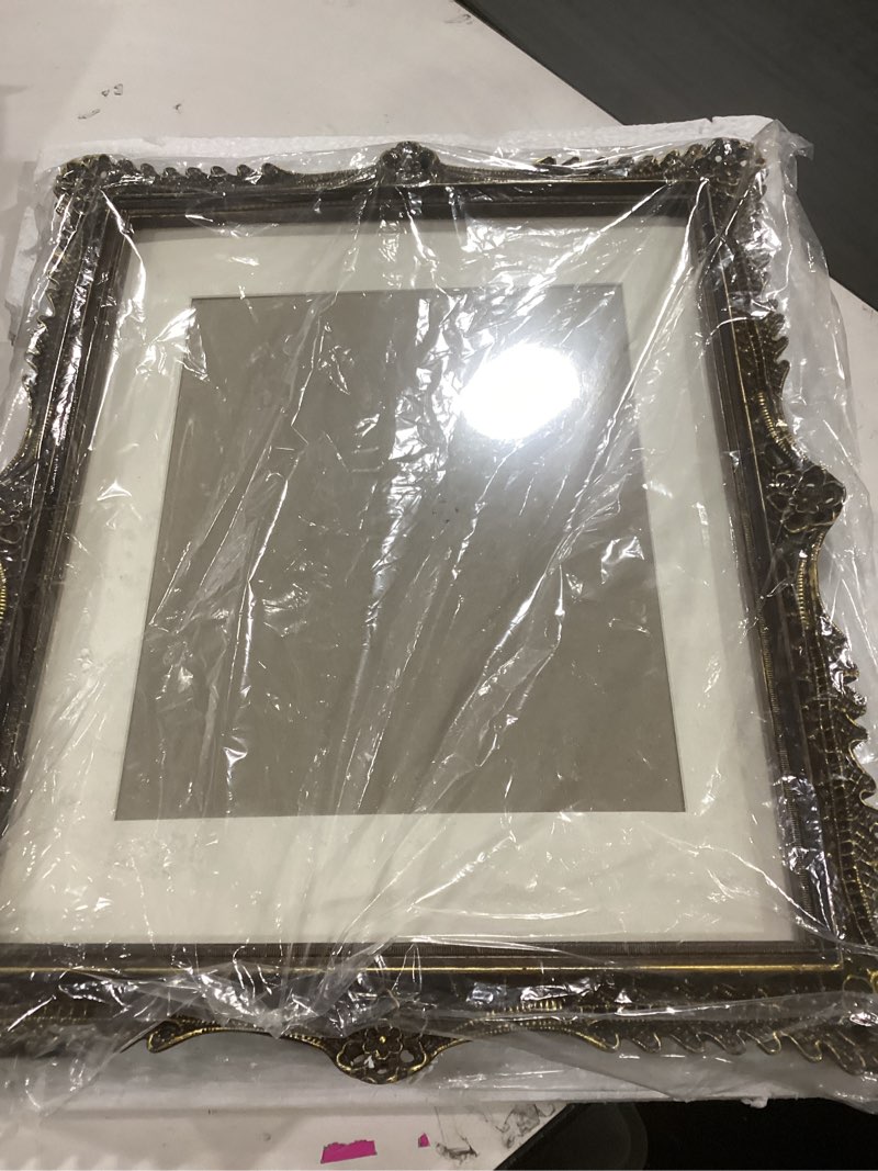 Condition photo showing As Is for SIMON'S SHOP 11x14 Frame with Mat for 8x10 Picture, Wall and Tabletop Picture Frames, Poster Frame 11x14, French Style Home Decor (Walnut) 11x14 Walnut