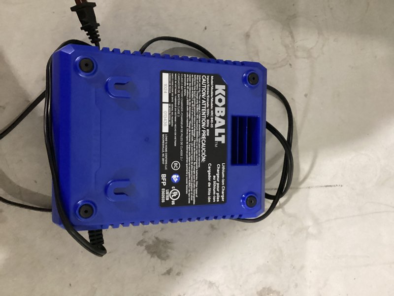 Condition photo showing As Is for kobalt 40v max 2.0 ah battery and charger combo