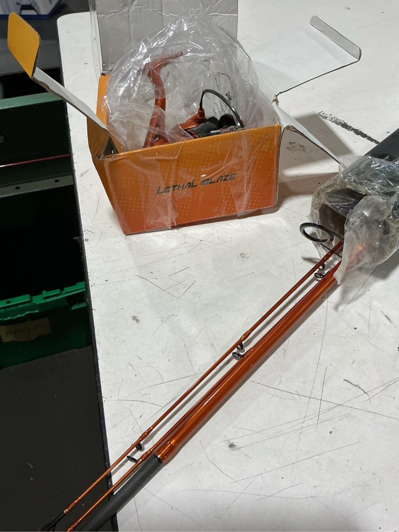 Condition photo showing Good Condition for kastking lethal blaze twin-tip fishing rod and reel combo, spinning & baitcaster combo, flame pattern design, im6 graphite 2pc rod with backup tip section, stainless-steel guides, eva handle spin-7'4" m-3000 reel (2pcs+extra tip)
