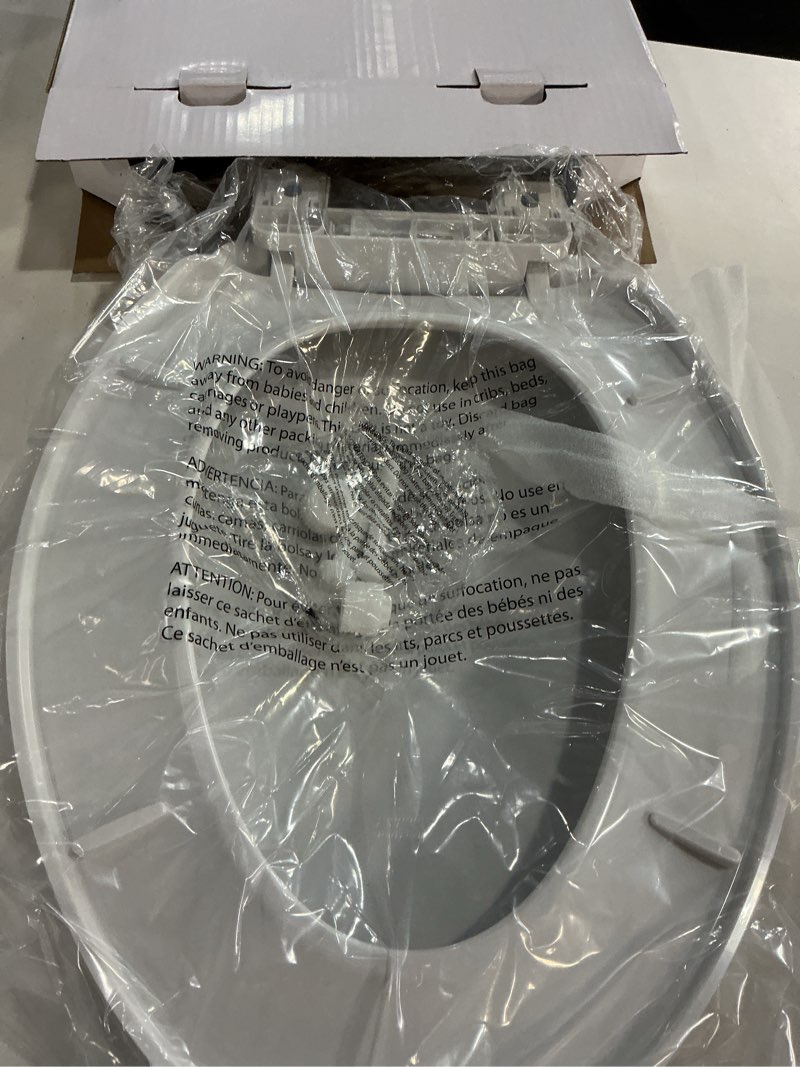 Condition photo showing New/Like New for american standard mightytuff plastic white elongated soft close toilet seat