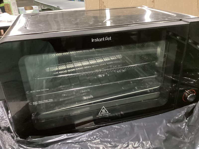 Condition photo showing Good Condition for instant pot no preheat required* 6-slice air fryer toaster oven with instantheat technology, 10-in-1, air fry, roast, bake, sear crisp, toast, bagel, broil, dehydrate, reheat, and make pizza 6-slice toaster oven